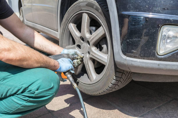 istock Mechanic changing a wheel of a modern car 1188557631