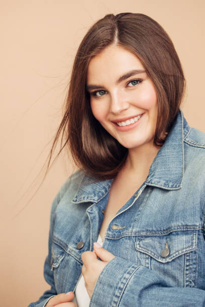 istock Joyful girl in casual outfit posing at studio 1188558870
