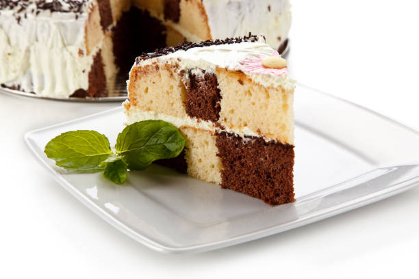 istock Chocolate cake with cream on white background 1188558886