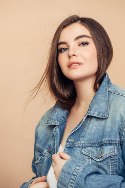 istock Joyful girl in casual outfit posing at studio 1188558891