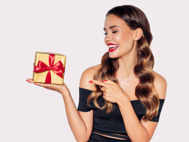 istock Beautiful woman with present 1188560484