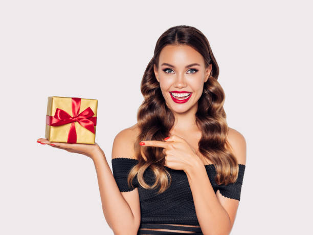 istock Beautiful woman with present 1188560499