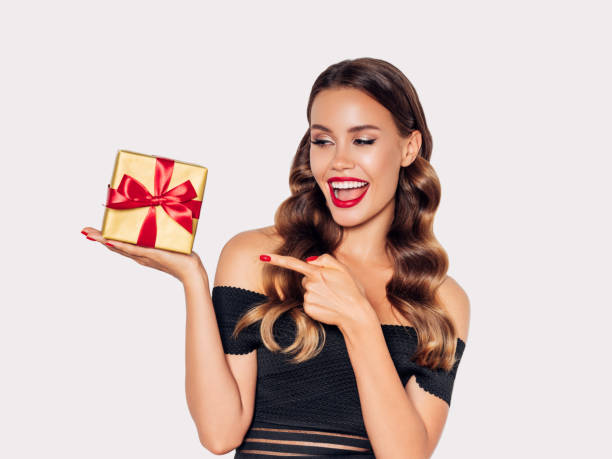istock Beautiful woman with present 1188560513