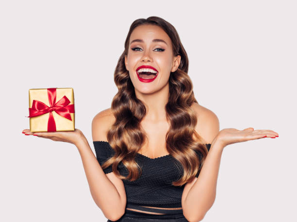 istock Beautiful woman with present 1188560567