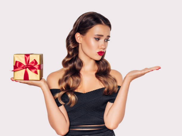 istock Beautiful woman with present 1188560595