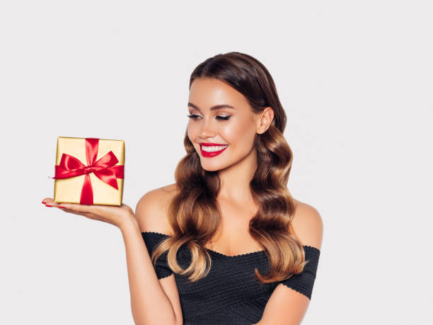 istock Beautiful woman with present 1188560611