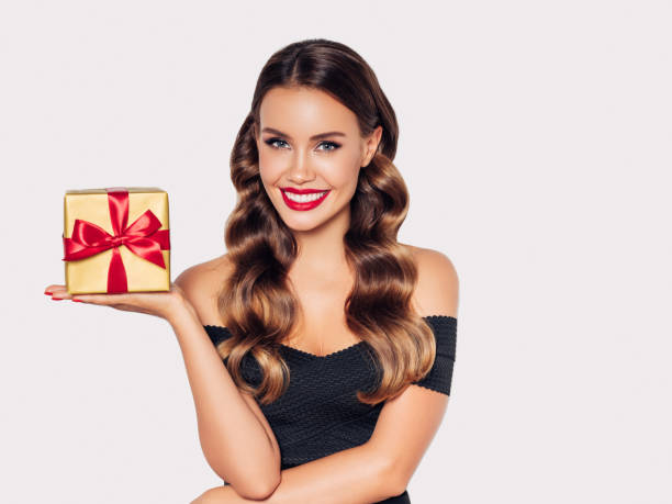 istock Beautiful woman with present 1188560623
