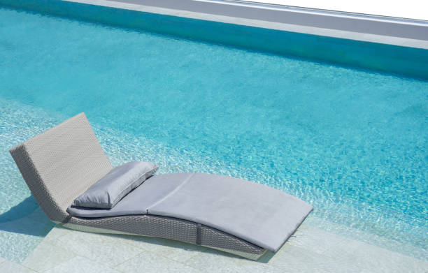 istock Blurred Relaxing pool bed with copy space on isolated white background 1188562919