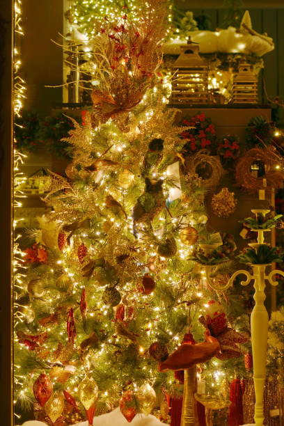 istock Christmas tree with gifts and decorations 2020 1188563298