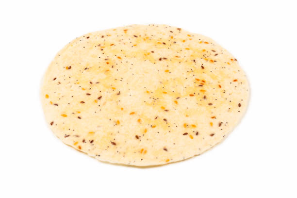 istock Pitta bread with seeds isolated on white 1188566373