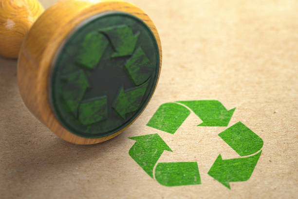 istock Recycle rubber stamp on craft paper. 1188569638