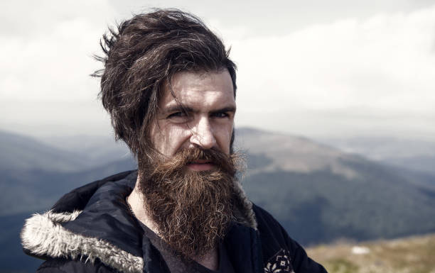 istock man hipster or guy with beard and moustache 1188569864