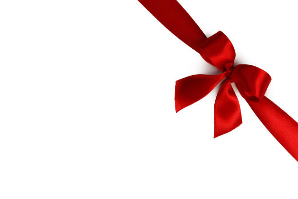 istock Red ribbon bow isolated on white 1188569891