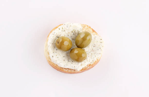 opened sandwich appetizer, Bruschetta, tapas, canape with various topping, ham, mortadella, tuna, cucumber, olives on white background