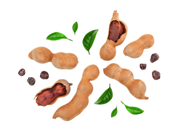 istock Tamarind fruit with leaf and seed isolated on white background, Top view. Flat lay 1188572006