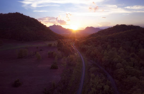 istock Beautiful scenery, railway path, golden sunset. 1188572409
