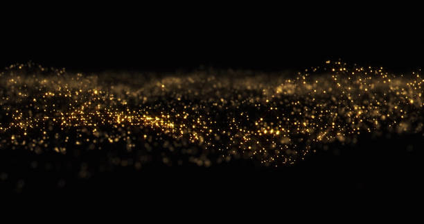 istock Gold glitter wave background, shining golden particles, glittering dust light. Gold glow and shimmering sparkles shine, abstract magic bright sparks 1188573018