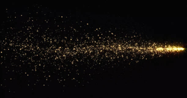 istock Golden glitter light comet trail, sparkling shine tail wave. Gold glittering shimmer, magic glowing golden glitter with light particles sparks 1188573592