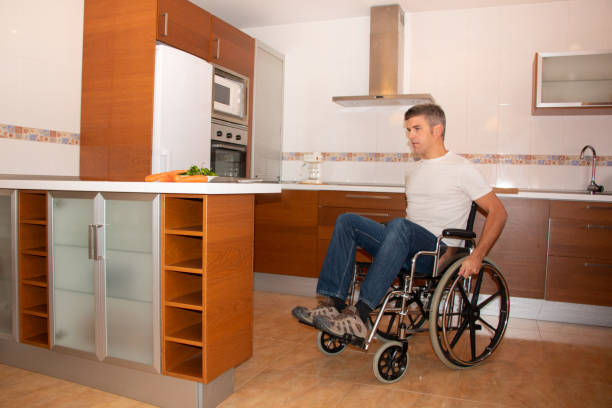 istock A man in a wheelchair moves through the kitchen 1188574306