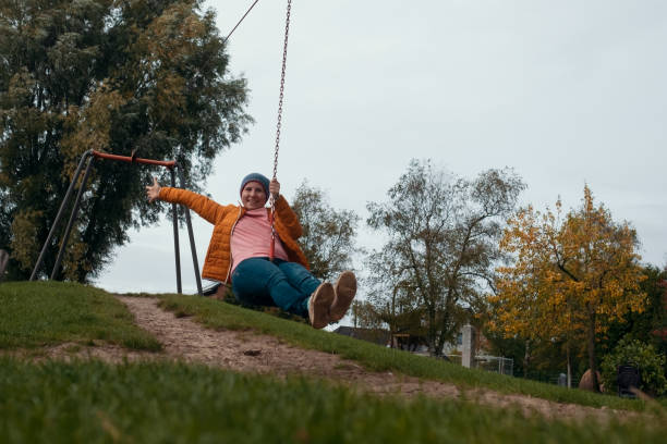 istock Caucasian woman having fun in zip line 1188574521