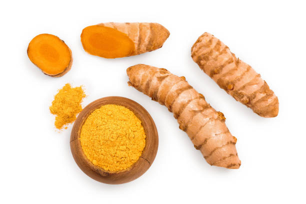 istock Turmeric powder and turmeric root isolated on white background. Top view. Flat lay 1188576275