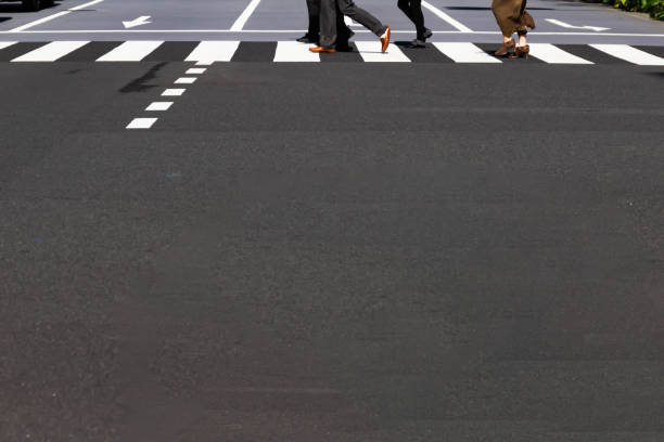istock Feet crossing a pedestrian crossing 1188577300