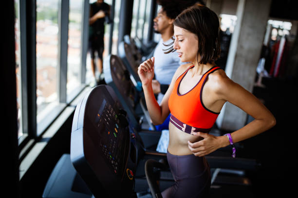 istock Healthy young athletes friends doing exercises at gym. 1188580874