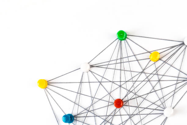 istock Network connection made from push pins and thread on blue background, close-up. 1188581805