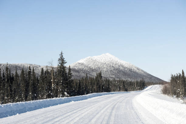 istock roads lead to snow mountain 1188581926