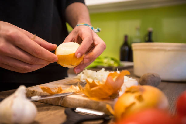 Young Chef Preparing Dinner - Stock Photo