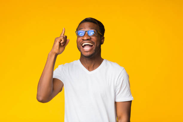 istock Black Man Pointing Finger Up Having Eureka Moment, Studio Shot 1188583230