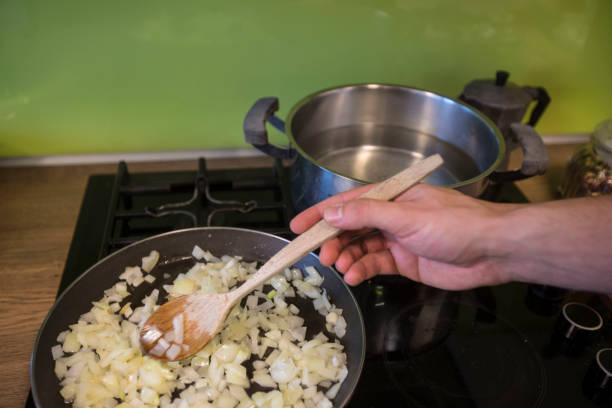 istock Cooking Romantic Dinner - Stock Photo 1188585141