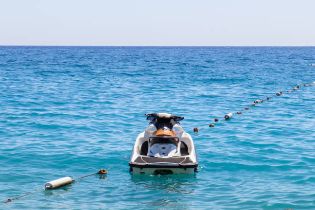 istock Water Scooter parked on a rope. Mediterranean Sea. Summer vacation. 1188589687