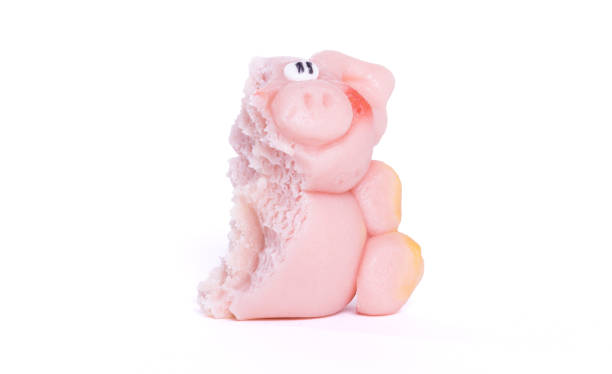 istock Marzipan pig, ready to be eaten, one bite already 1188594663