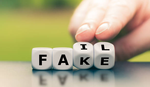 istock Hand turns a dice and changes the word 