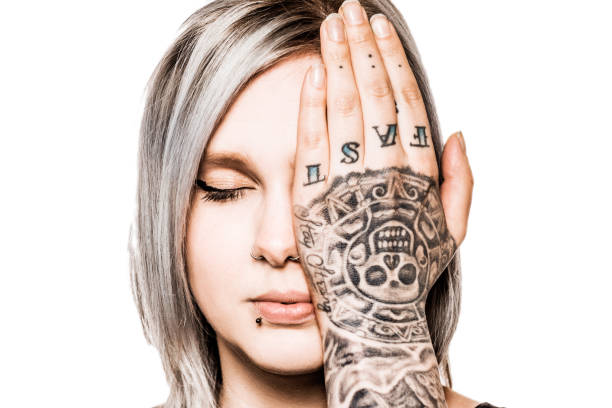 Beautiful Tattooed Woman in studio shoot