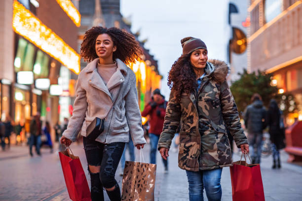 istock Mother and daughter Christmas Shopping 1188599080
