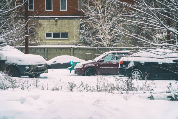 istock Cars under snow in Parking lot 1188602105