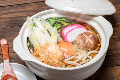 Nabeyaki Udon is a hot udon noodle soup traditionally served in individual donabe or iron pots