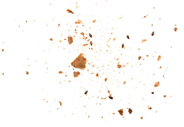 Crumbs isolated Crumbs isolated on white background mini wheat cereal stock pictures, royalty-free photos & images