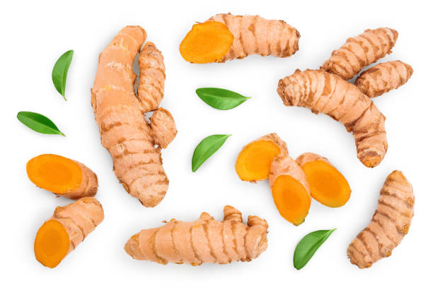 turmeric root and slices isolated on white background. Top view. Flat lay turmeric root and slices isolated on white background. Top view. Flat lay. turmeric stock pictures, royalty-free photos & images