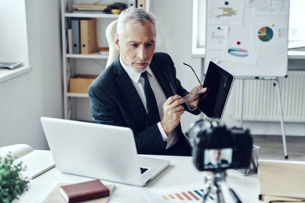 istock Senior man in elegant business suit 1188605496