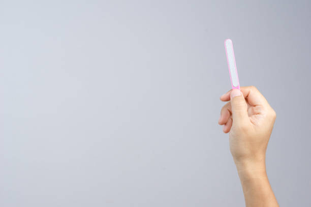 istock Hand holding nail file for manicuring and pedicure, a cosmetic tool 1188605505