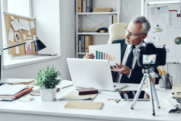 istock Senior man in elegant business suit 1188605524