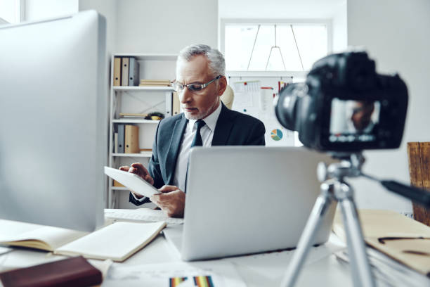 istock Senior man in elegant business suit 1188605554
