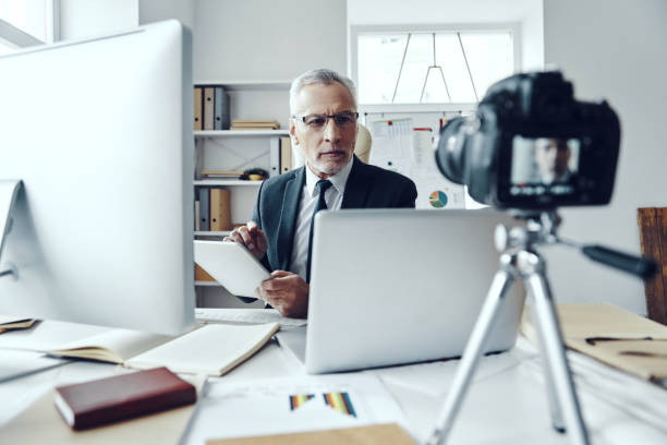 istock Senior man in elegant business suit 1188605576