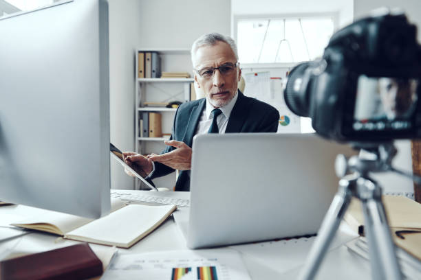 istock Senior man in elegant business suit 1188605580