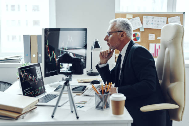 istock Senior man in elegant business suit 1188606226