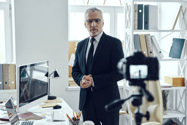 istock Senior man in elegant business suit 1188606349