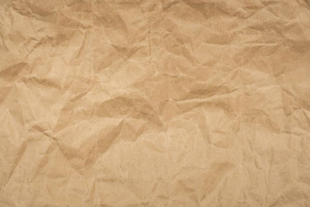 istock Crumpled brown paper texture vintage background. 1188606663